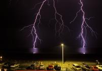 Slide scan made from Jim's own 35MM slide.  Hampton Beach, NH ocean lightning strike