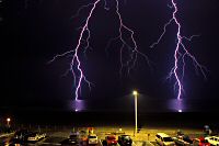 Lightning Bolts over the Ocean Double Strike